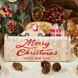Wooden Merry Christmas sign featuring Santa and sleigh for festive door or wall decoration