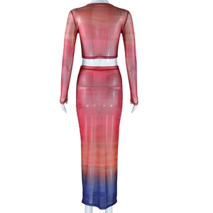Detail of red and blue gradient mesh fabric on the long sleeve top and maxi skirt set