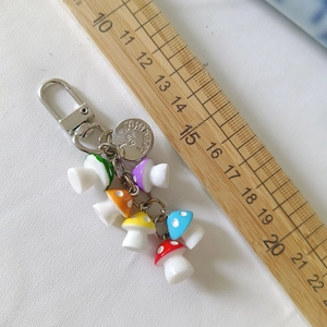 Colorful DIY mushroom keychain with six resin charms and engraved I am beautiful metal plate