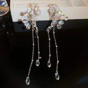 Silver flower tassel earrings with crystal drops and sparkling butterfly accents