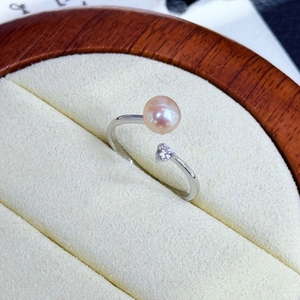 Adjustable silver ring with purple freshwater pearl and zircon in jewelry box
