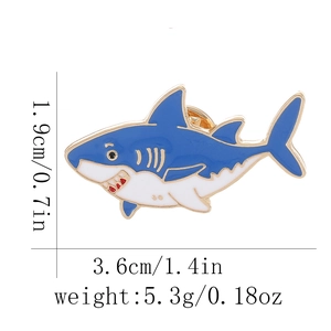 Shark enamel pin dimensions 3.6cm by 1.9cm with gold plating and blue finish detail