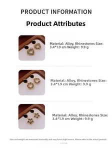 Vue détaillée des boucles d'oreilles étoile avec dimensions 3,4x1,9cm et poids 9,9g