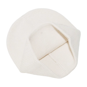 Macro detail of white ribbed knit fabric texture on a warm winter beanie hat