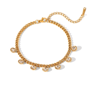 Macro view of 18K gold plated stainless steel chain with round zircon stones and S-STEEL tag
