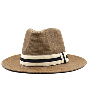 Classic brown woven straw fedora hat with striped band for sun protection and beach fashion