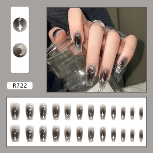 Detail of moon and star nail art on black-gray gradient press-on nails set R722