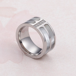 Wide band silver ring featuring white mother of pearl inlay and zircon accents