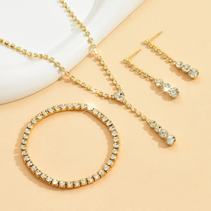 Sparkling gold tennis jewelry set with crystal necklace, bracelet and earrings