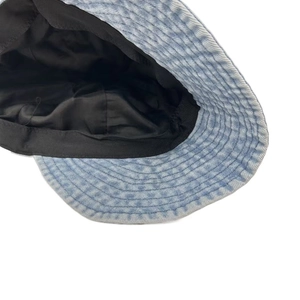 Washed denim bucket hat for women with blue white texture and UV protection