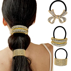 Three-piece gold metal ponytail cuff set with sparkling rhinestones and elastic hair tie