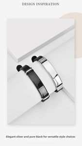 Close-up of modern silver and black stainless steel silicone bracelets on display