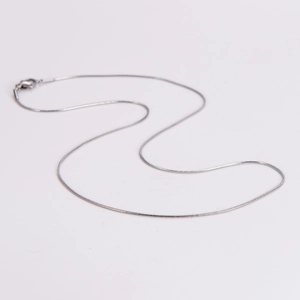 Minimalist 1mm silver stainless steel snake bone chain necklace with sleek metallic luster