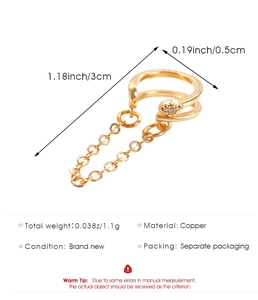 Detailed view of gold chain ear cuff with copper material specs and 1.1g weight info