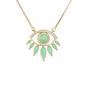 Gold evil eye necklace with green stones, zircon accents and hanging teardrop charms