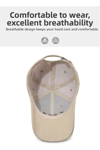 Detail view of cotton baseball cap interior showing breathable mesh and adjustable metal buckle