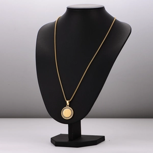 18k gold plated stainless steel portrait pendant necklace with crystal accents on stand