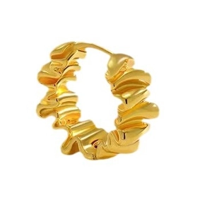 Luxurious gold irregular hoop earrings with textured wavy design for modern women