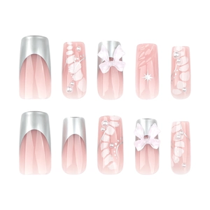Sweet pink gradient press-on nails with 3D bows and silver French tips design