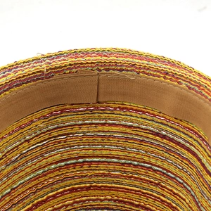 Detailed close-up showing internal multi-color straw weaving and brown inner sweatband
