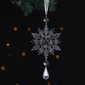 Transparent crystal snowflake Christmas ornament with teardrop pendant and silver ribbon