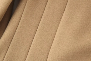 Macro view of premium camel wool fabric texture with thick and soft finish