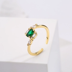 Elegant gold plated open ring with green oval stone and marquise zircon accents