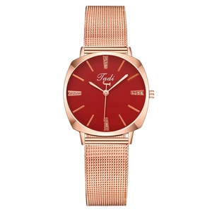 Fashionable rose gold mesh strap watch for women with rhinestones and a deep red dial