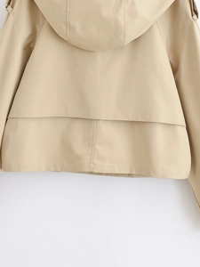 Detail view of the hooded khaki trench coat back cut and high-quality fabric texture