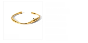 Detail view of 18k gold plated stainless steel irregular open cuff bangle dimensions