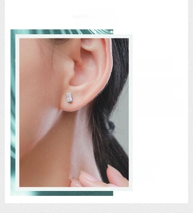 Detail showing a minimalist s925 silver stud earring with rectangular zircon on ear