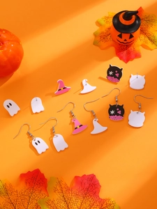 Halloween acrylic earring set with ghost and cat motifs on festive orange background