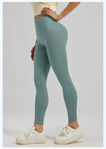 Vue latérale détaillée du legging de yoga taille haute vert sauge avec gainage abdominal