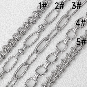 Close-up of five silver stainless steel chain styles for DIY jewelry making