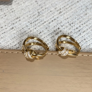 Elegant 18K gold plated knotted circle earrings with sparkling cubic zirconia inlay