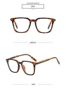 Detail view showing front and side of demi square frame sunglasses with metal rivet accents