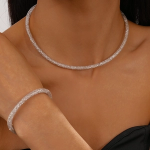 Sparkling silver zircon mesh geometric necklace and bracelet jewelry set on model