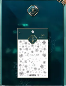 Detailed view of TS-030 black floral 5D embossed nail art stickers in premium packaging