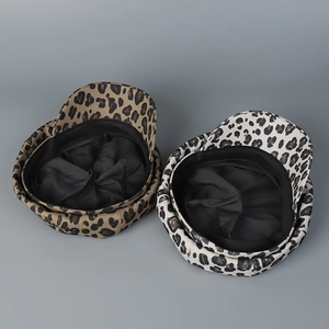 Brown and white leopard print newsboy caps with breathable fabric and retro style