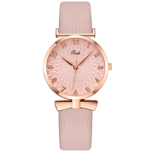 Pink fashion quartz watch for women with rose gold case and textured leather strap
