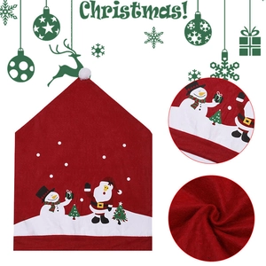 Christmas chair covers set with red festive Santa and snowman patterns for dining decor