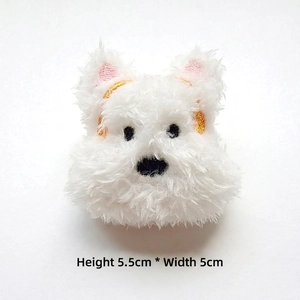 Detail of white plush Westie dog accessory with dimensions 5.5cm height and 5cm width