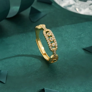 Elegant gold geometric square hollow ring with white cubic zirconia in an open design