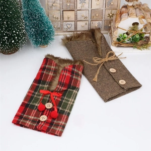Detail of Christmas wine bottle covers featuring plaid patterns and faux fur collars