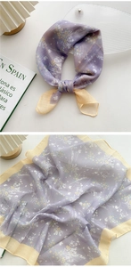 Detailed texture of lavender and yellow floral cotton linen scarf with soft draping