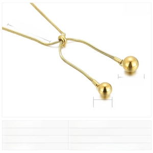 Detail of adjustable golden stainless steel snake chain with polished ball charms