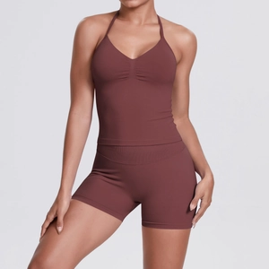 Front view of halter neck sports top and high waist shorts set in dark brown knit