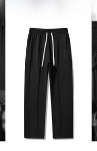 Detail of men's loose straight trousers featuring white drawstring and middle seam pleats
