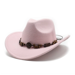 Close-up of pink wool felt cowboy hat with dark brown wooden bead trim and band