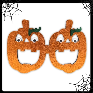 Détail de lunettes de fête en feutrine citrouille pailletée orange avec yeux mobiles